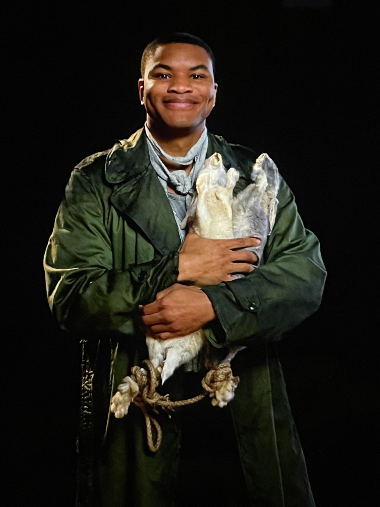 Period drama character portrait lit on a black stage, cinematography by Keith Ingram