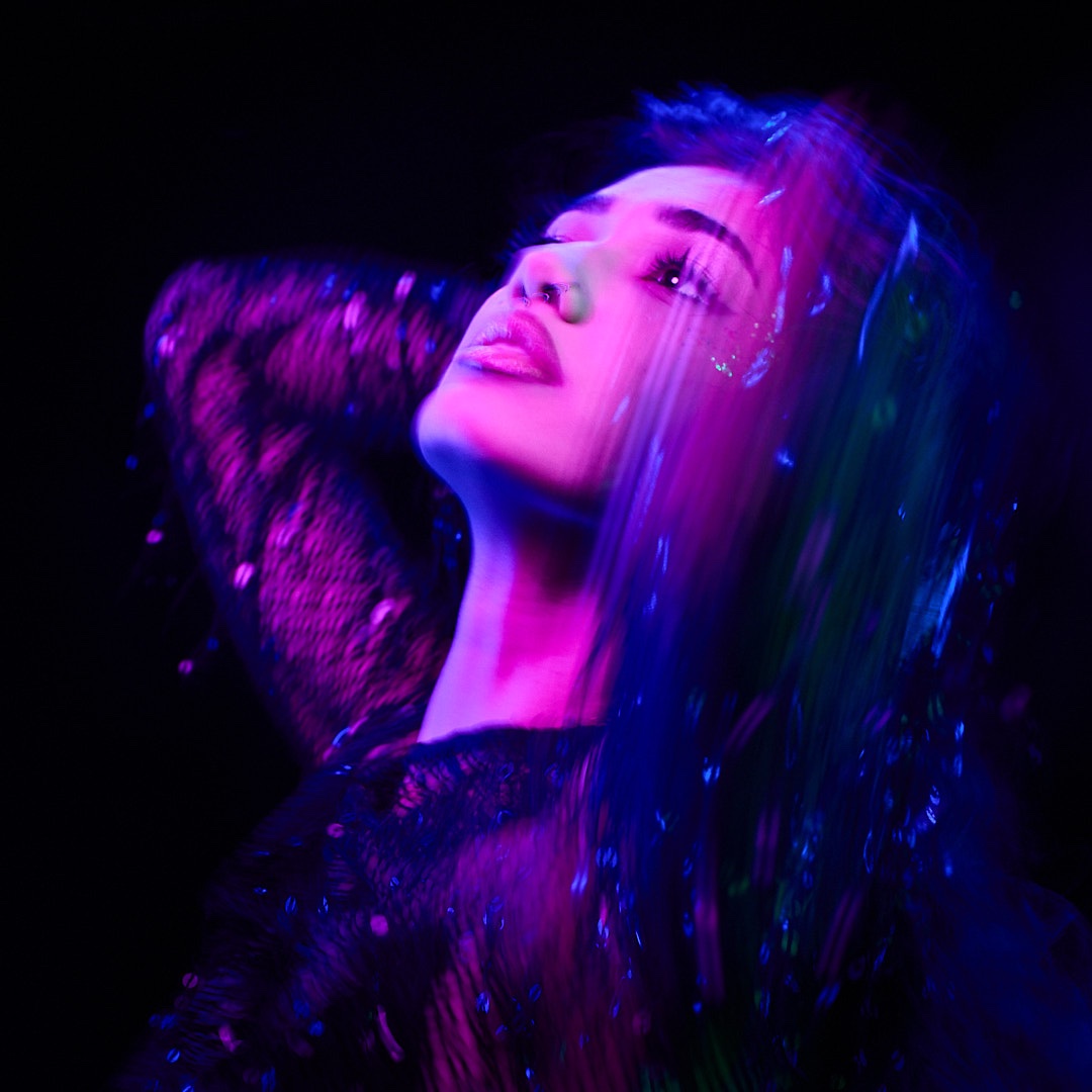 Neon-lit portrait, blue and magenta, for Scottish Opera — cinematography by Keith Ingram
